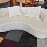 Luxurious Curved Cream Sofa